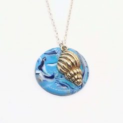 Summer seaside. polymer clay teardrop pendant in seaside shades with a shell charm