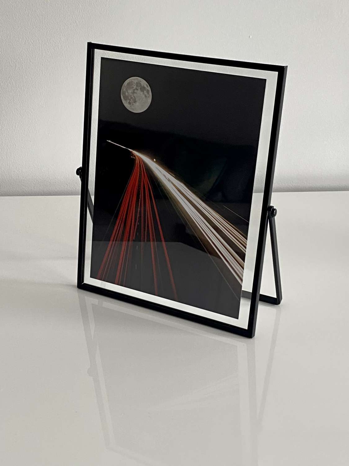 Moon Highway in glass window frame Moon Highway in glass window frame