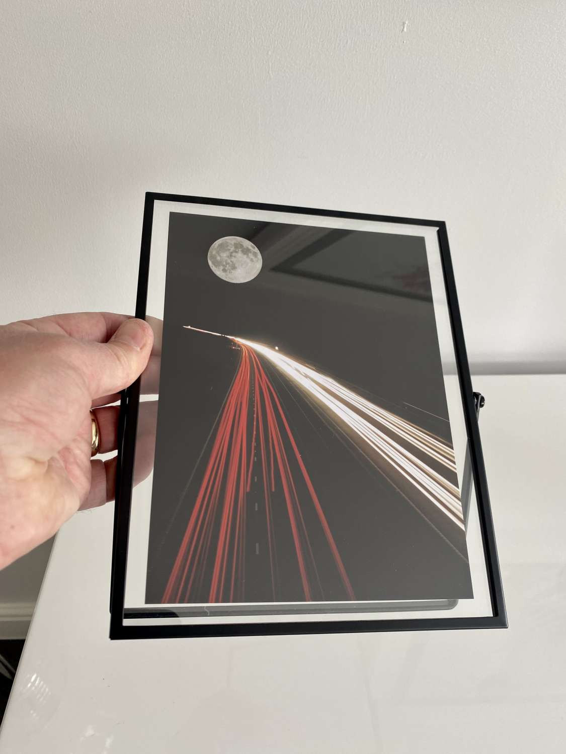 Moon Highway in glass window frame Moon Highway in glass window frame