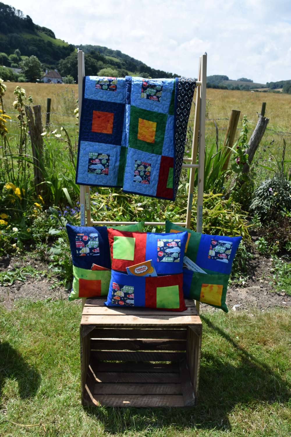 Multicoloured car squares patchwork quilt Multicoloured car squares patchwork quilt