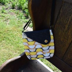 Upcycled yellow and black shoulder bag right