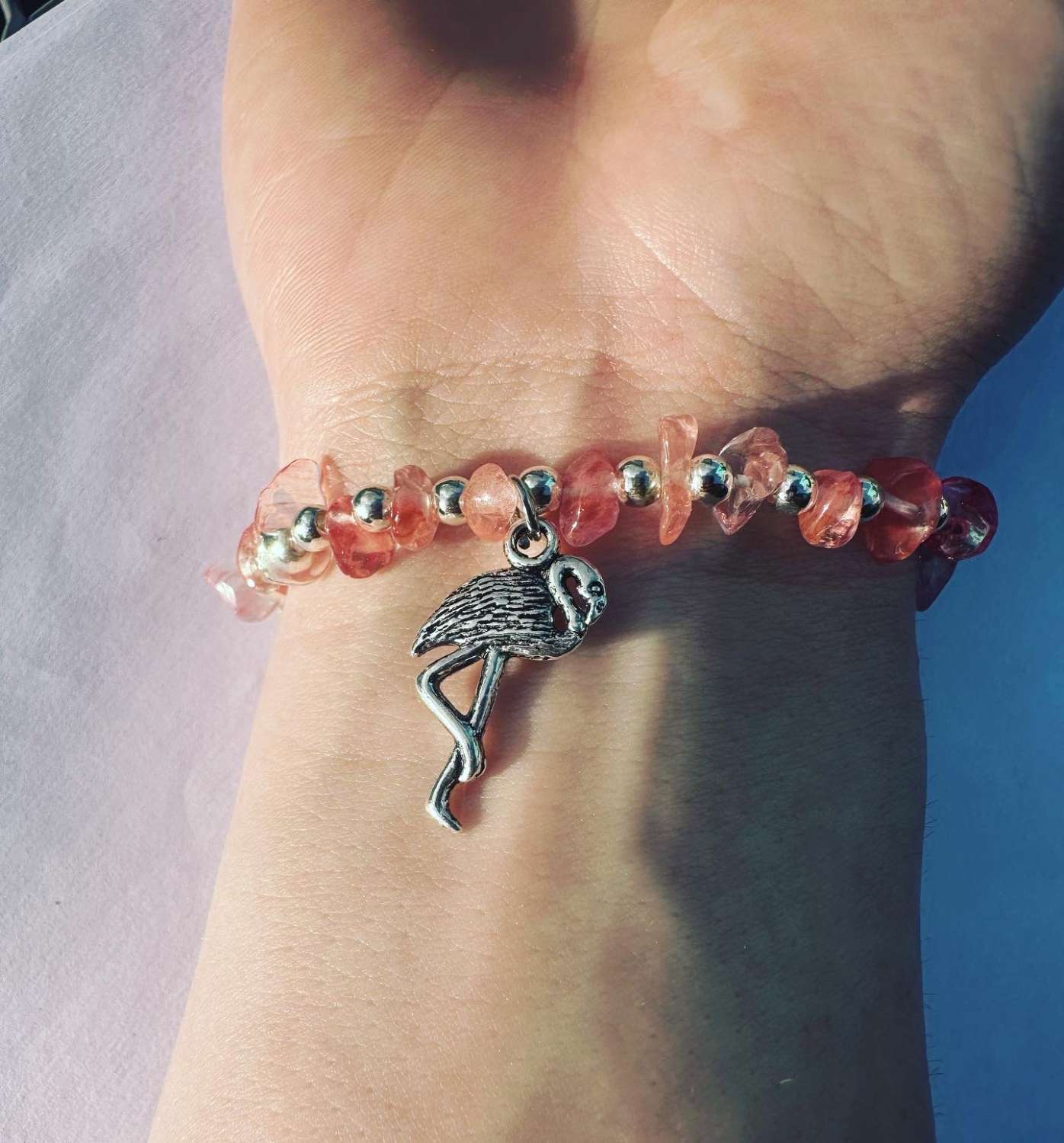 Cherry quartz chip bracelet with silver flamingo charm Cherry quartz chip bracelet with silver flamingo charm