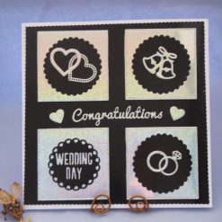 Monochrome Wedding Day Card, with hearts, bells & rings
