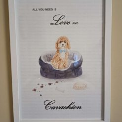 Cavachion Print, Dog Wall Art, Cavachion wearing a Light Blue Polka Dot Bow Tie sitting in a cosy Dog Bed, Home Decor, Dog Lover Framed Print