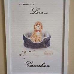 Cavachion Print, Dog Wall Art, Cavachion wearing a Red Bow Tie sitting in a cosy Dog Bed, Home Decor, Dog Lover Framed Print