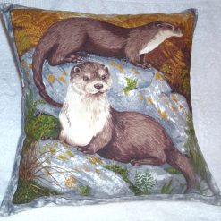 Two Otters on the rocks cushion
