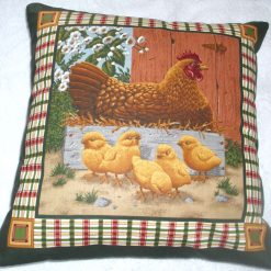 Chicken and chicks in the farmyard cushion.