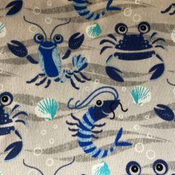 Novelty blue/grey crab themed organic jersey fabric