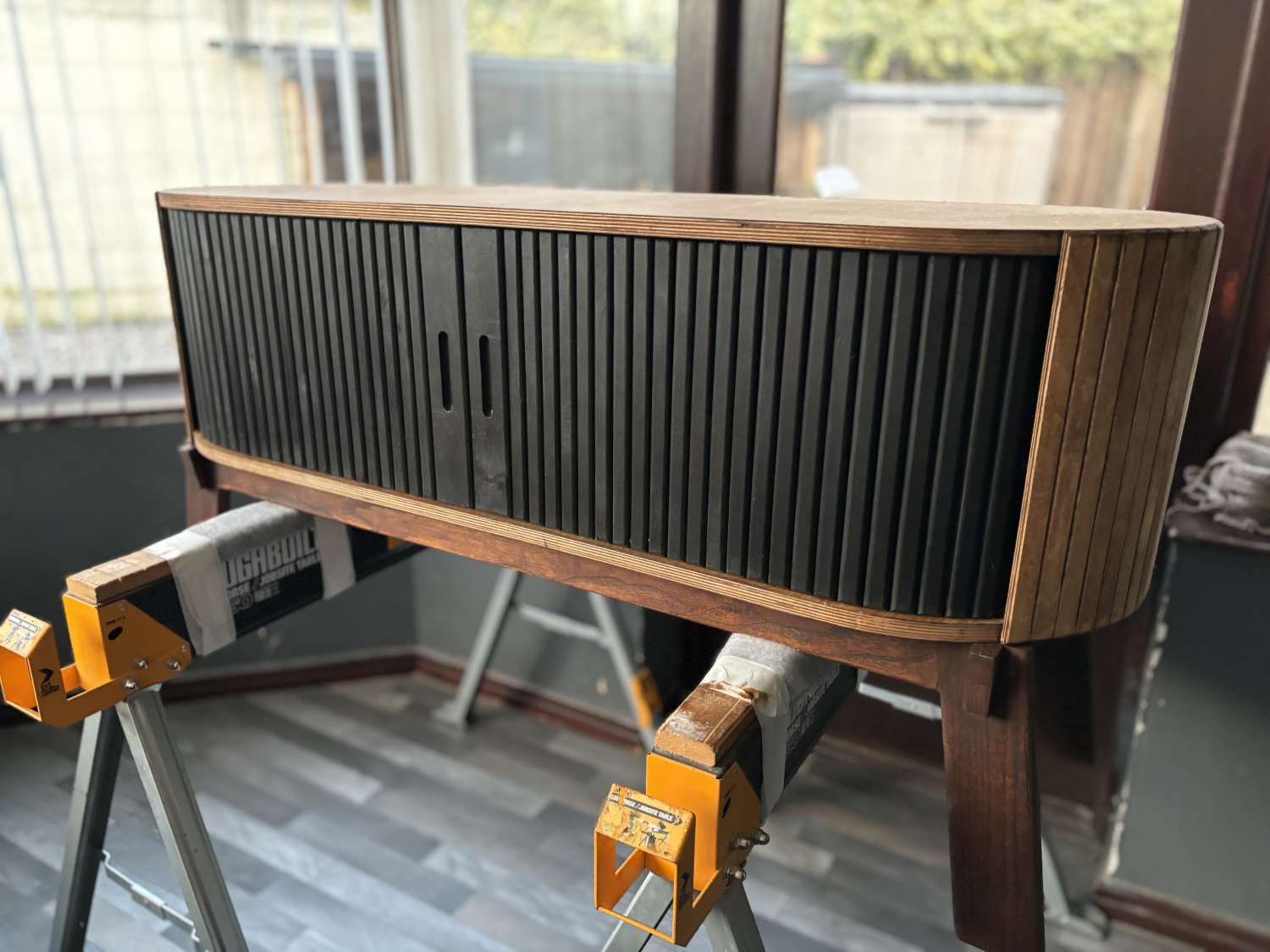 Introducing Our Birch Ply Tambour TV Stand with Walnut Stain and Black