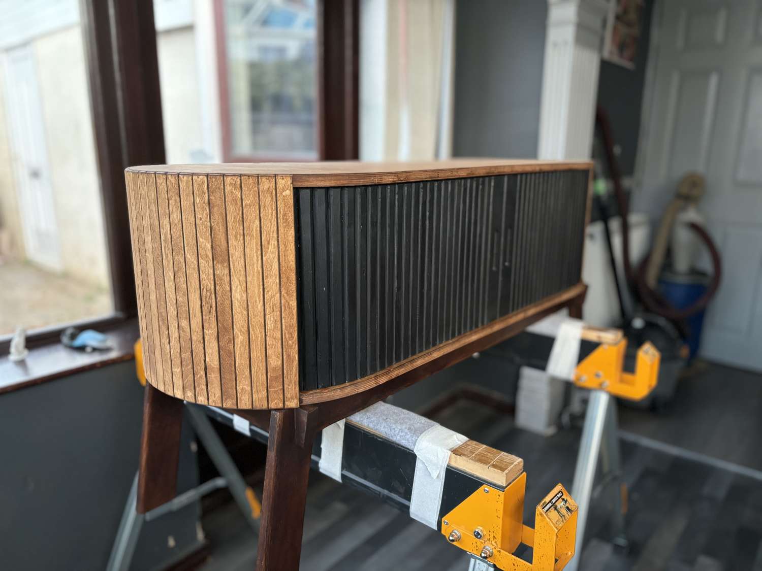 Introducing Our Birch Ply Tambour TV Stand with Walnut Stain and Black