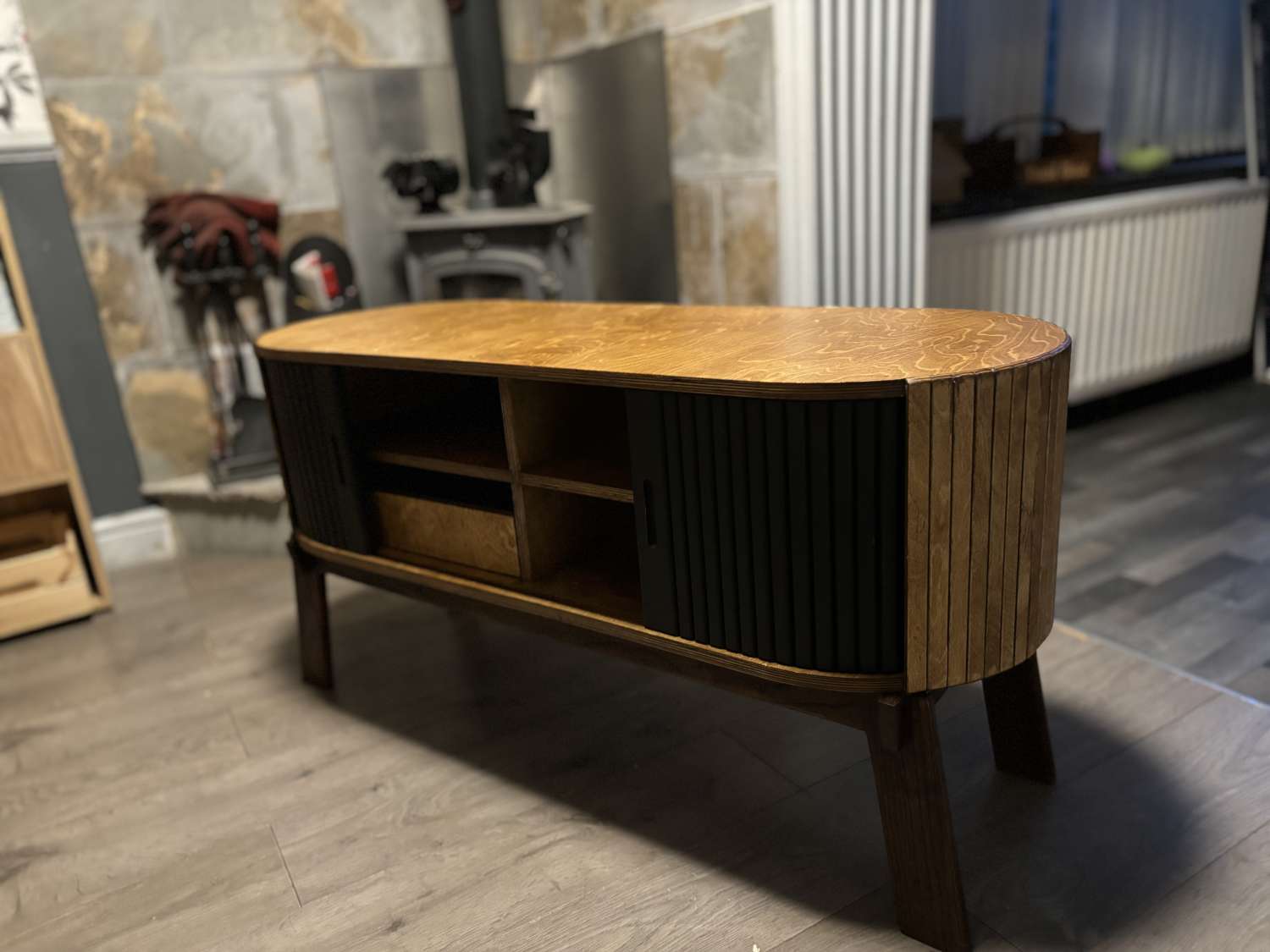 Introducing Our Birch Ply Tambour TV Stand with Walnut Stain and Black