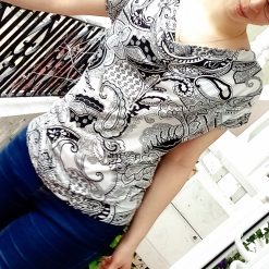 Elegant women top, with dropped neck and open strapped back