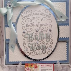 Luxury Handmade New Baby - Congratulations on the birth of your Baby Boy - Oval sentiment to centre with embossed background and pretty pale blue bow & ribbon