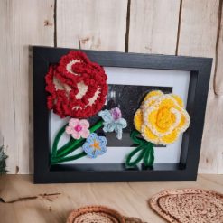 photo frame decorated with crochet flowers