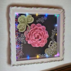 hanging frame with crochet flowers