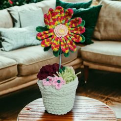multi-coloured crochet flower in pot