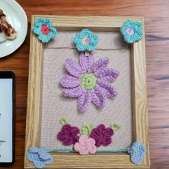 wooden frame with crochet flowers