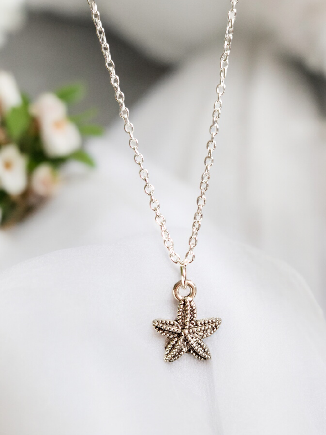 A Beautiful Sterling Silver Starfish Pendant Necklace A Beautiful Sterling Silver Starfish Pendant Necklace