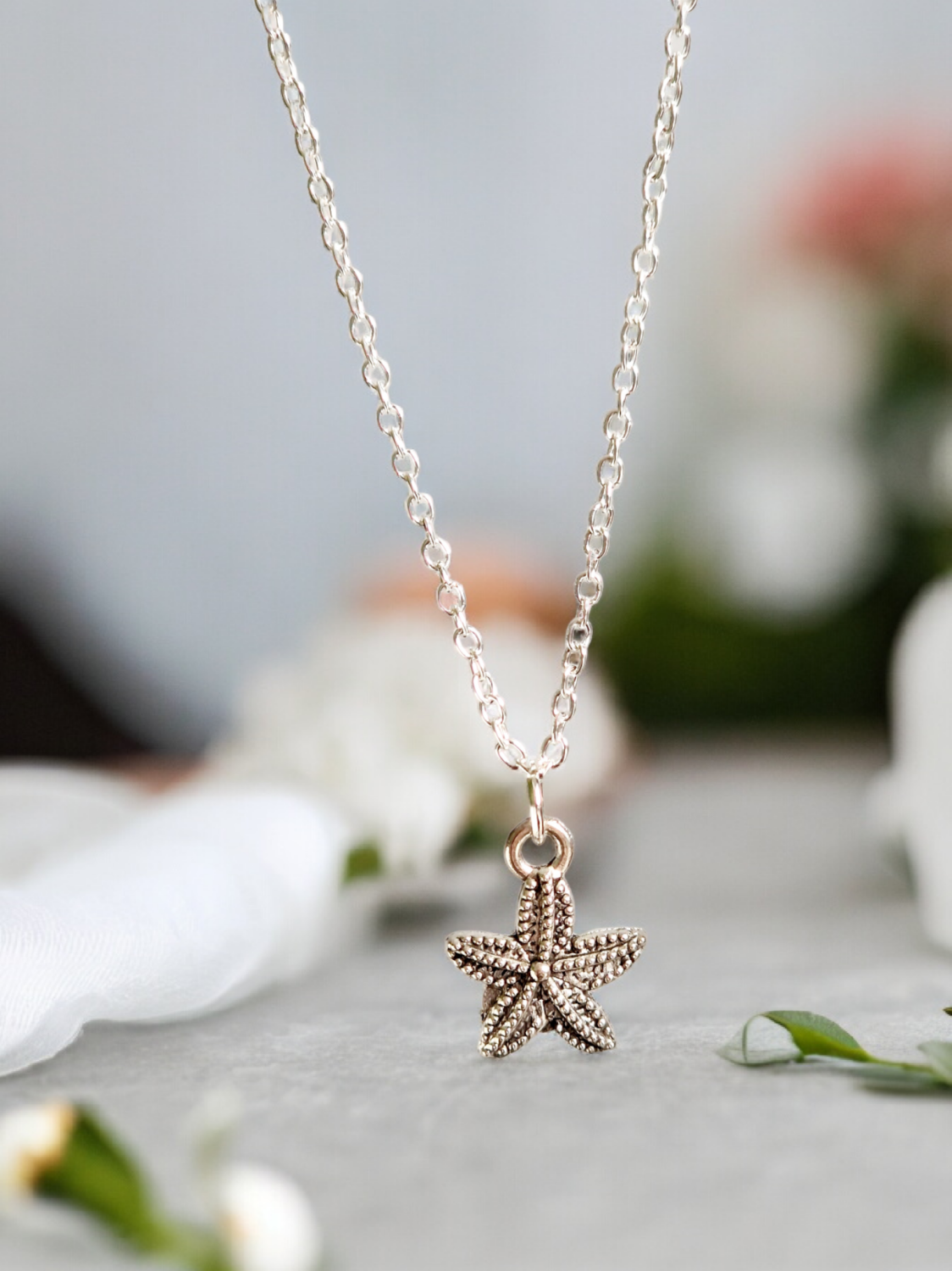 A Beautiful Sterling Silver Starfish Pendant Necklace A Beautiful Sterling Silver Starfish Pendant Necklace
