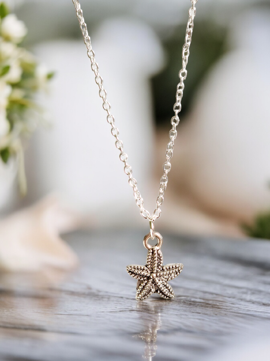 A Beautiful Sterling Silver Starfish Pendant Necklace A Beautiful Sterling Silver Starfish Pendant Necklace