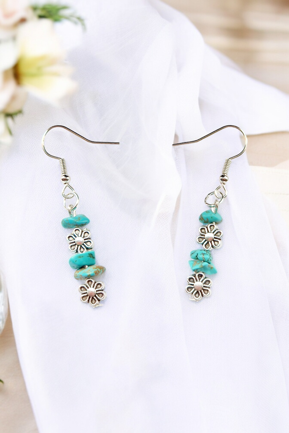 A Beautiful Pair of Turquoise Gemstone and Silver Daisies Dangle Earrings A Beautiful Pair of Turquoise Gemstone and Silver Daisies Dangle Earrings