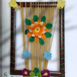 wood frame with crochet flowers
