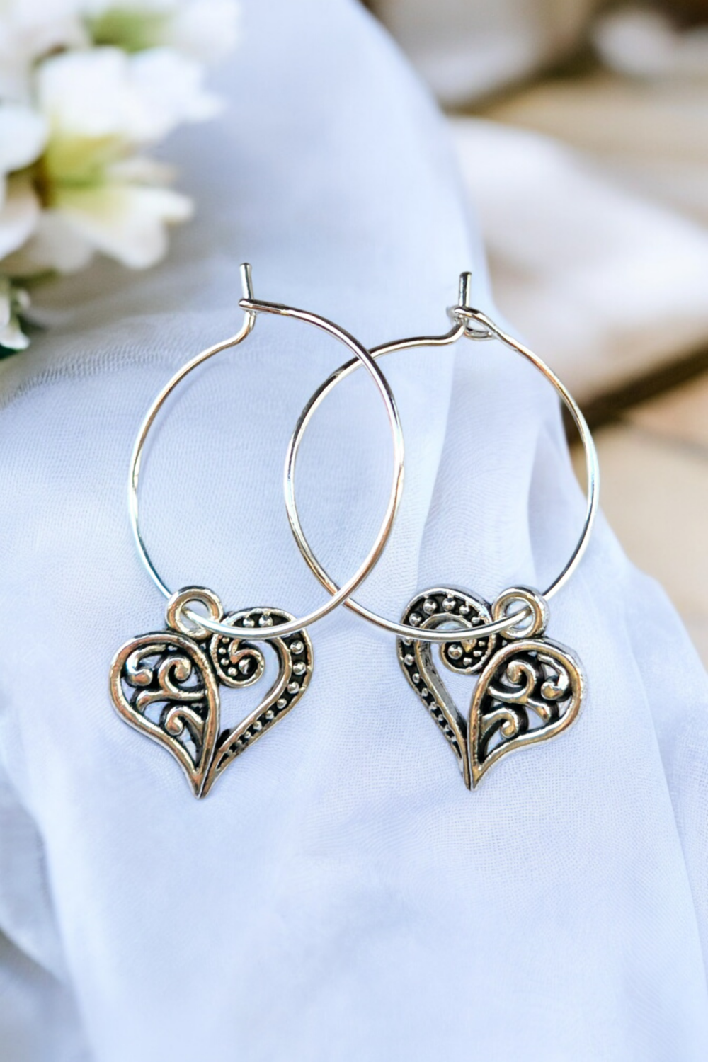 A Beautiful Pair of Silver Heart Hoop Earrings A Beautiful Pair of Silver Heart Hoop Earrings