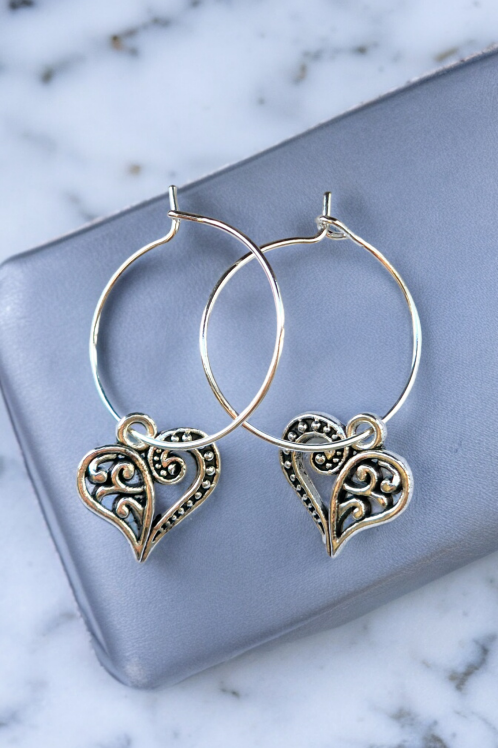 A Beautiful Pair of Silver Heart Hoop Earrings A Beautiful Pair of Silver Heart Hoop Earrings