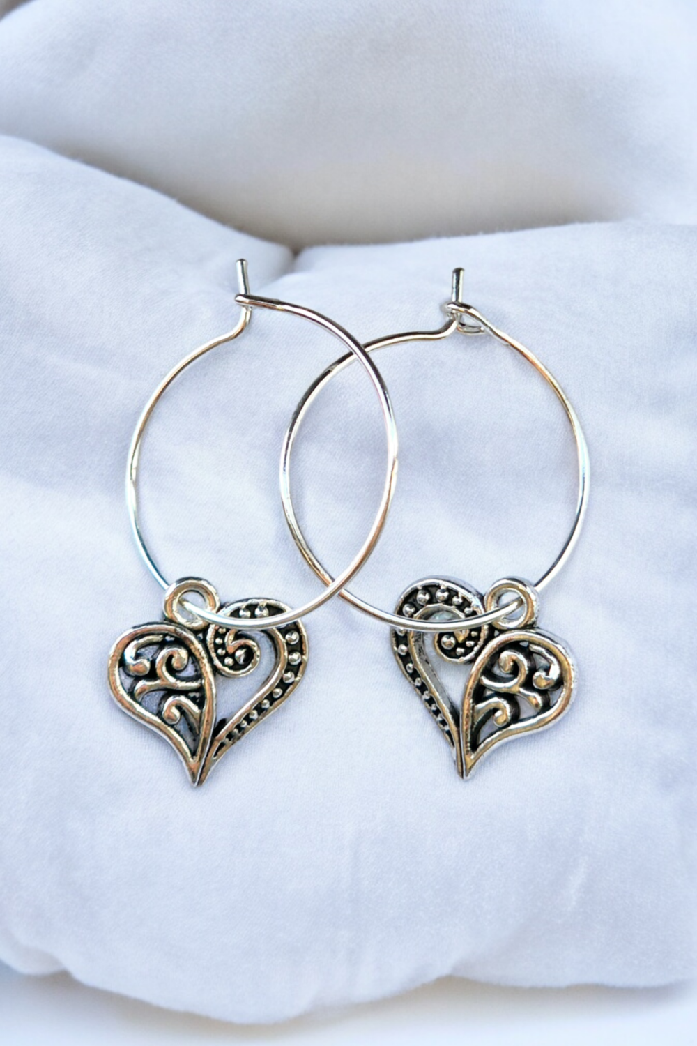 A Beautiful Pair of Silver Heart Hoop Earrings A Beautiful Pair of Silver Heart Hoop Earrings