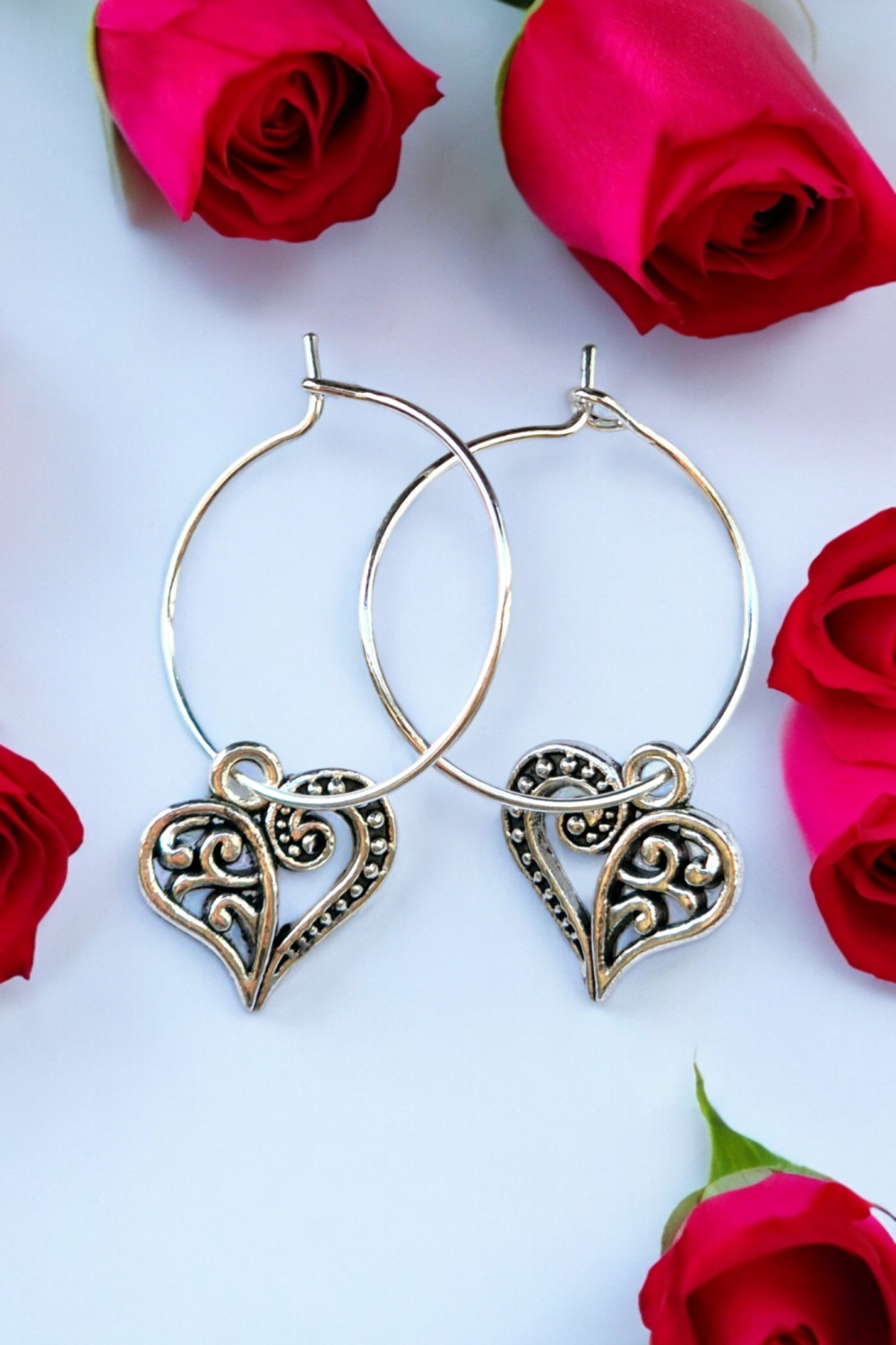 A Beautiful Pair of Silver Heart Hoop Earrings A Beautiful Pair of Silver Heart Hoop Earrings