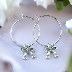 A Beautiful Pair of Silver Bow Hoop Earrings