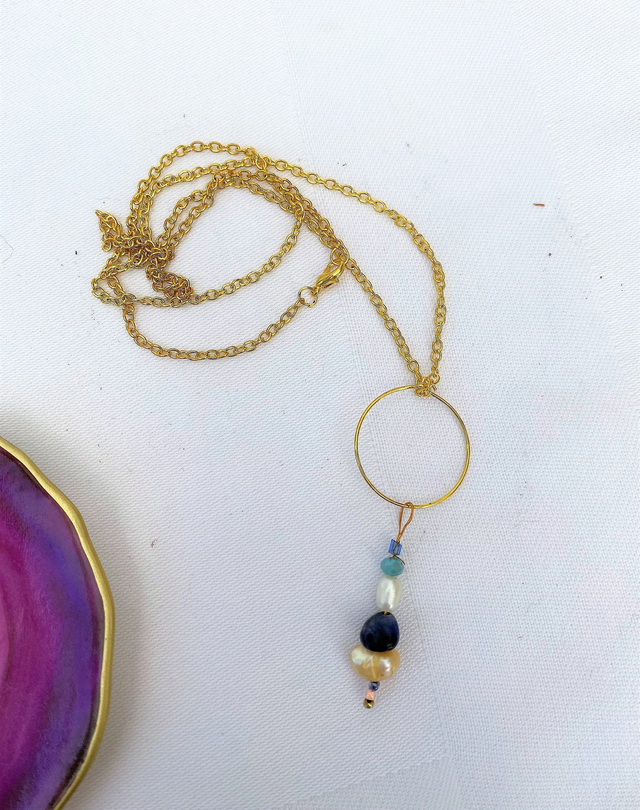Sea Foam Gold Tone Charm Necklace Sea Foam Gold Tone Charm Necklace
