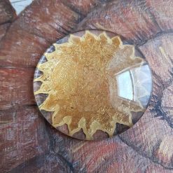 Gold Sun glass paperweight