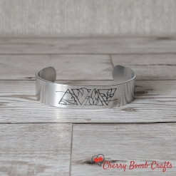 Elemental engraved cuff bangle