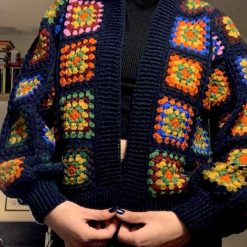 Cozy up in style with our Handcrafted Crocheted Cardigan Multi-coloured! Size 8-10 UK