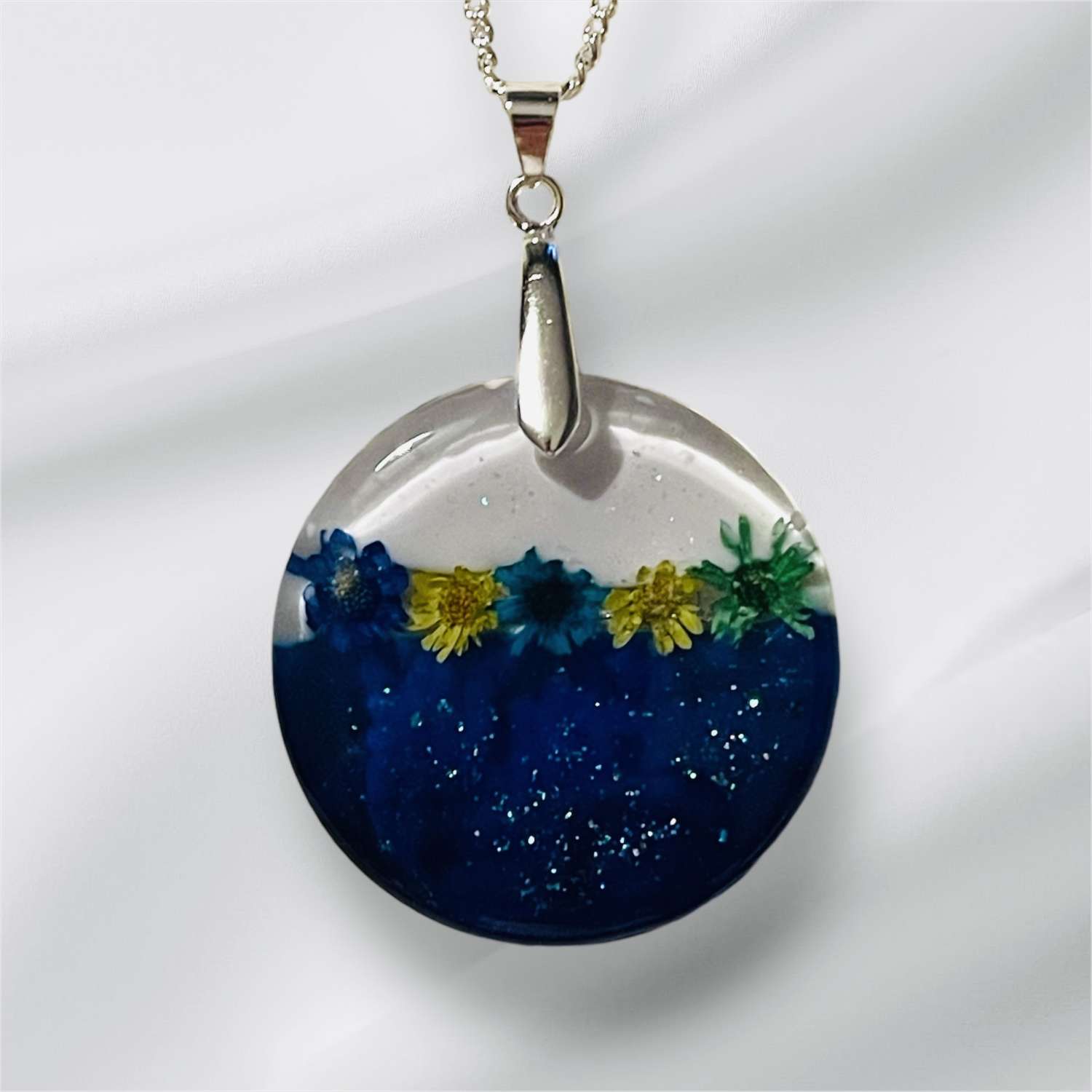 Resin Pendant on a 20" Silver Chain Resin Pendant on a 20" Silver Chain