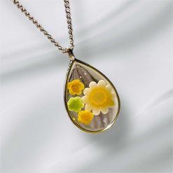 Oval Resin real dried flower Pendant on a 20" Silver Chain