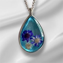 Oval Resin real dried flower Pendant on a 20" Silver Chain