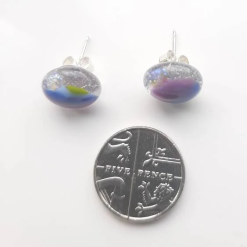 One of a kind, purple, blue, green and clear dichroic rainbow glass studs. 1 One of a kind, purple, blue, green and clear dichroic rainbow glass studs. 1