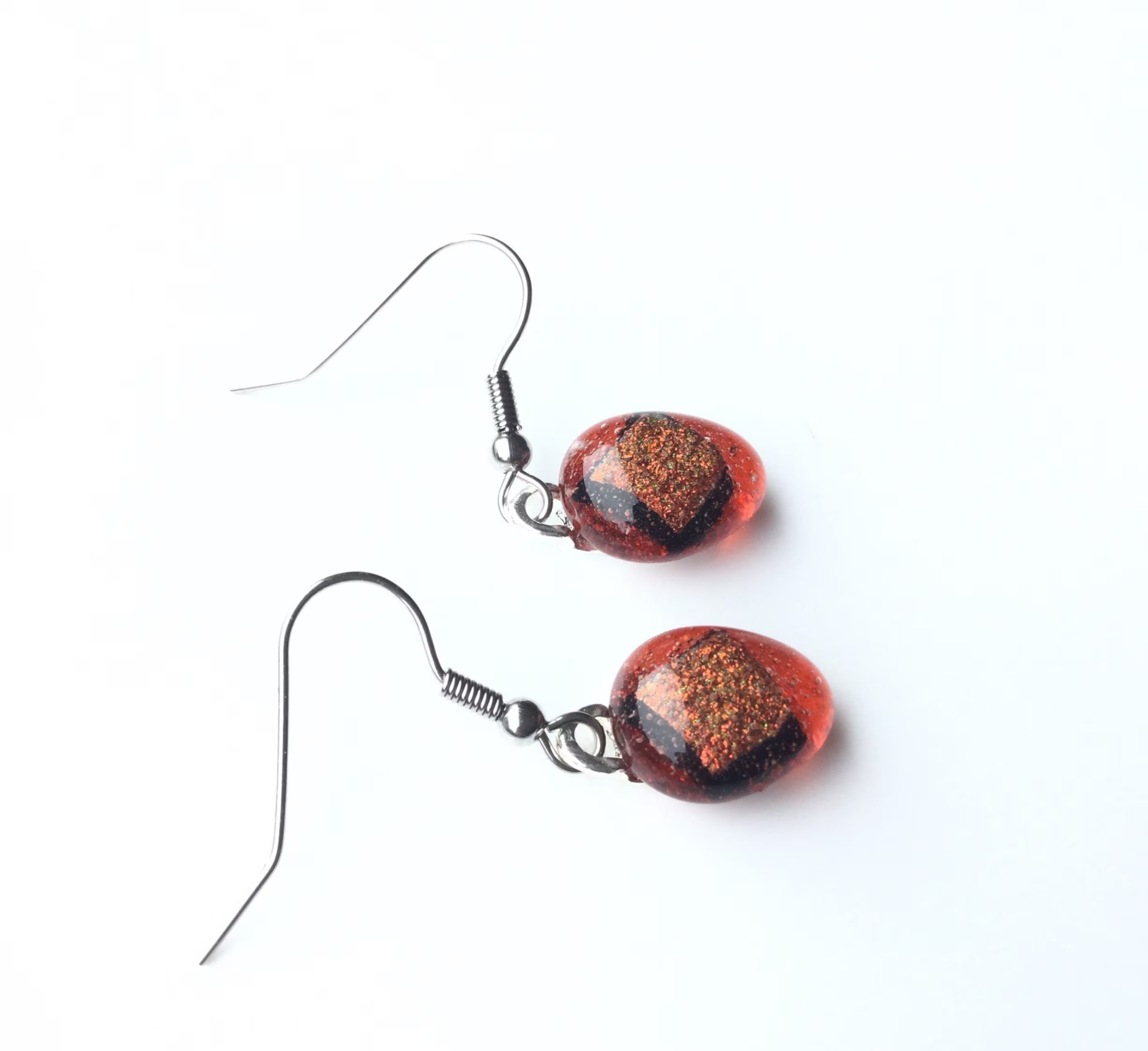 Pretty, orange dichroic, teardrop, quirky earrings. Vibrant, different earrings. Pretty, orange dichroic, teardrop, quirky earrings. Vibrant, different earrings.