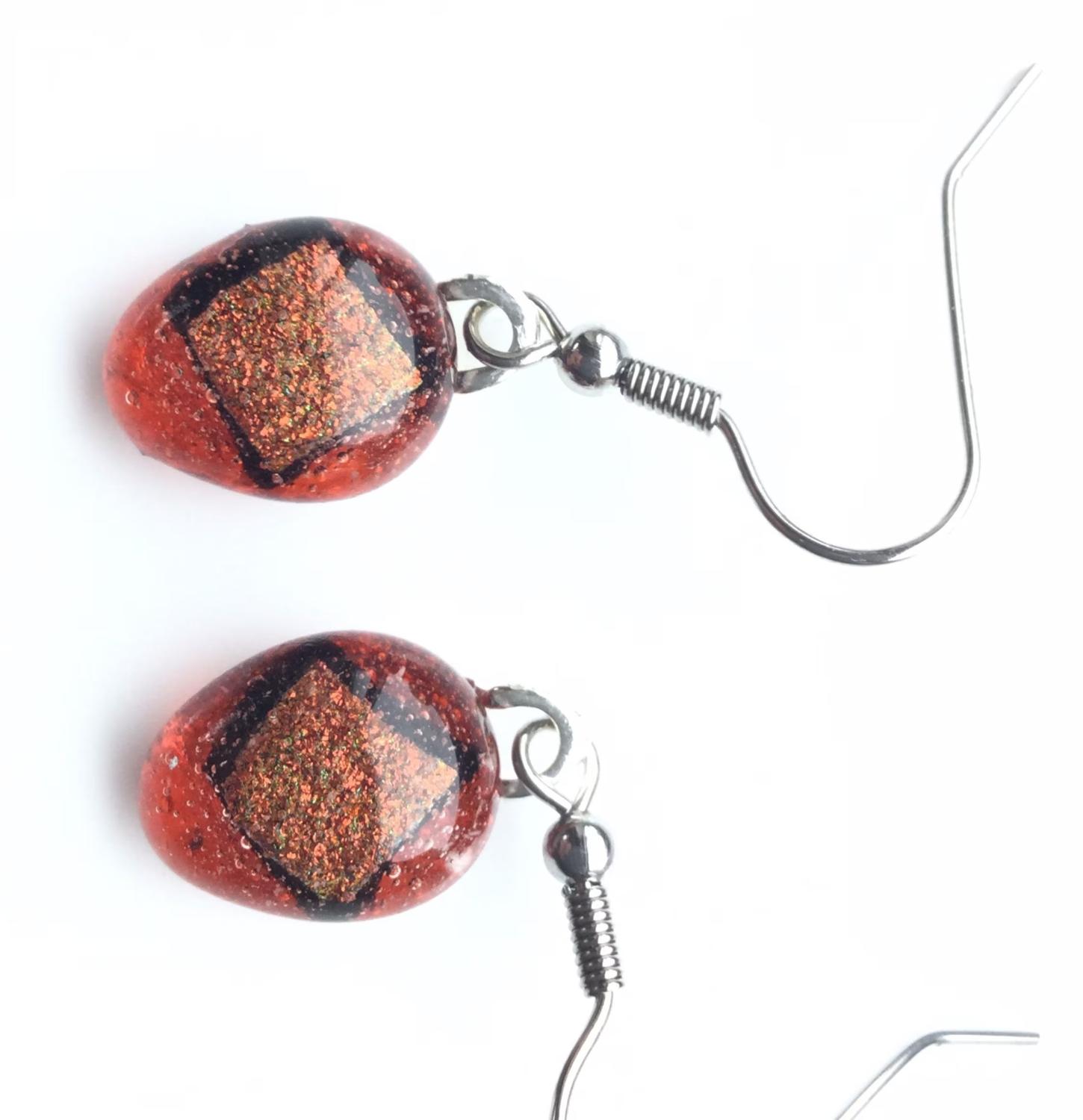 Pretty, orange dichroic, teardrop, quirky earrings. Vibrant, different earrings. Pretty, orange dichroic, teardrop, quirky earrings. Vibrant, different earrings.