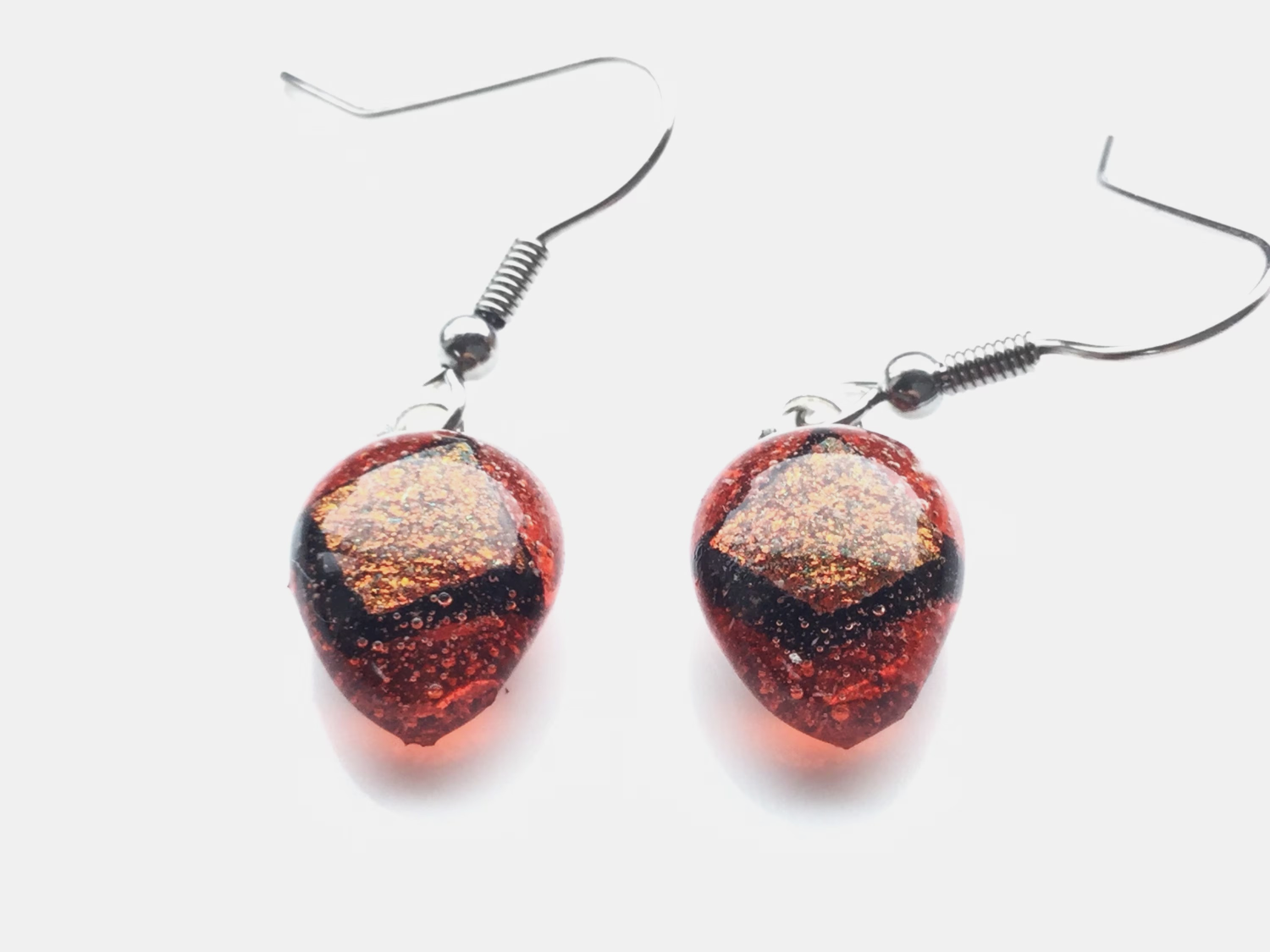 Pretty, orange dichroic, teardrop, quirky earrings. Vibrant, different earrings. Pretty, orange dichroic, teardrop, quirky earrings. Vibrant, different earrings.