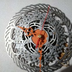 Recycled Bicycle Parts Hand Made Clock 160mm wall clock everything has been cleaned and fully lacquered so would never rust This is a clock made from used bicycle parts. The size in diameter is 16 cm, they have a new quartz movement that runs on a 1AA battery (not included).