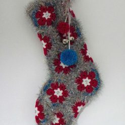 Sparkly Blue and Pink, Crochet Christmas Stocking, with yarn tinsel embellishments, pompoms and bells.