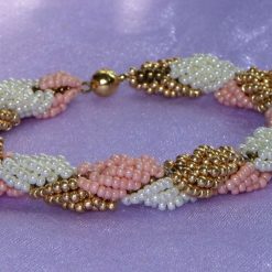 Beaded Bracelet featuring Shells of Salmon, Ivory and Gold.