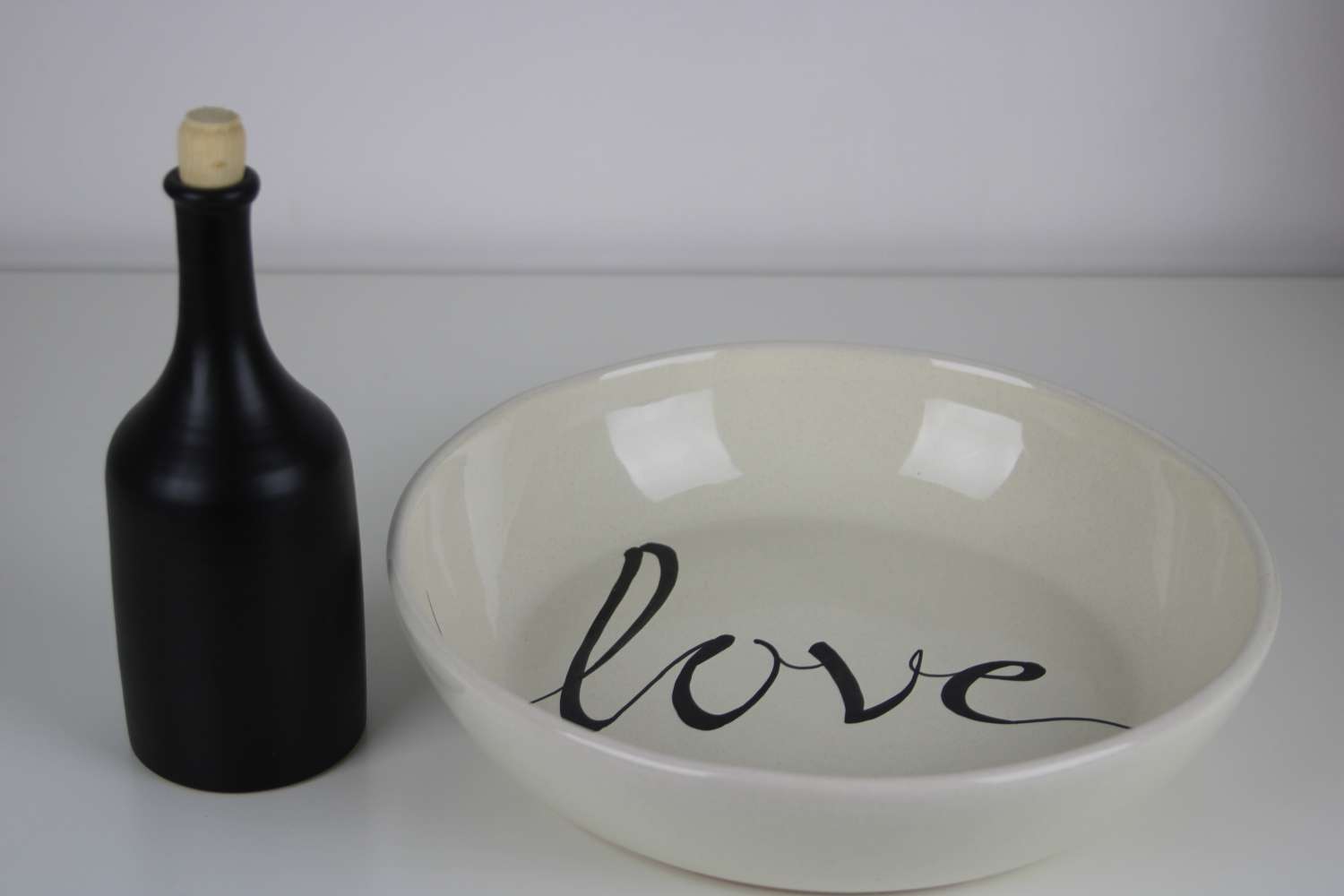 "Elegant Handmade Stoneware 'Love' Serving Bowl & Black Oil Bottle Set" "Elegant Handmade Stoneware 'Love' Serving Bowl & Black Oil Bottle Set"