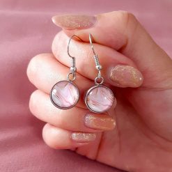 Light pink and gold glass cabochon dangle earrings