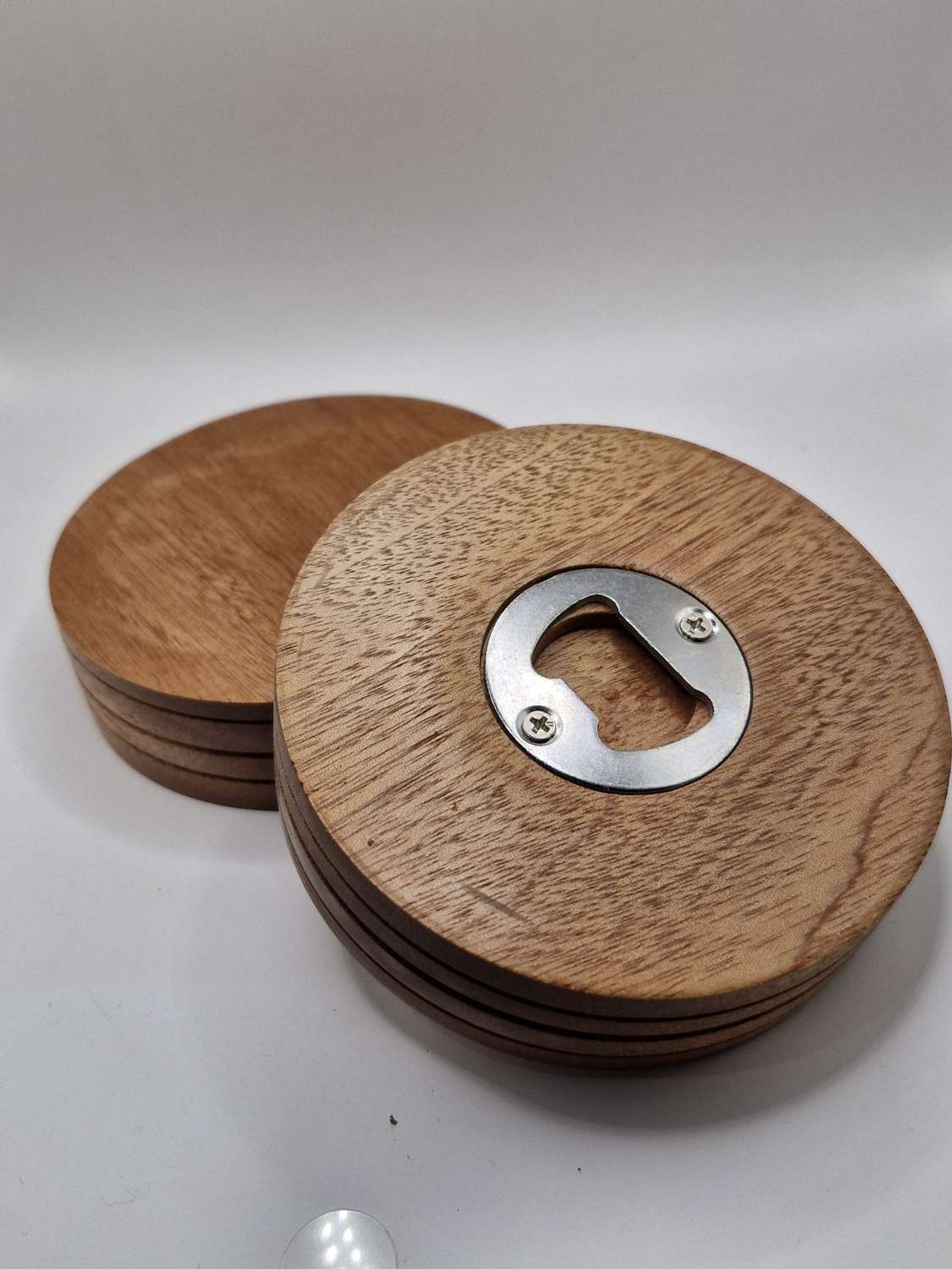 Bottle opener coasters set of two. Bottle opener coasters set of two.