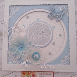 Luxury Handmade Birthday - Happy Birthday - Seashell Blue & white, white frame, embossed background, sentiment to middle with glittery butterfly