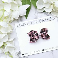 Dusty pink glitter bow